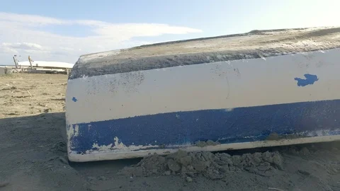 Sliding past a rowing boat which is stranded Video stock 91705093