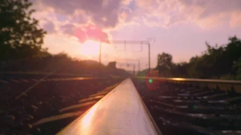 Sliding on the Railroad rail Stock Footage 76139448