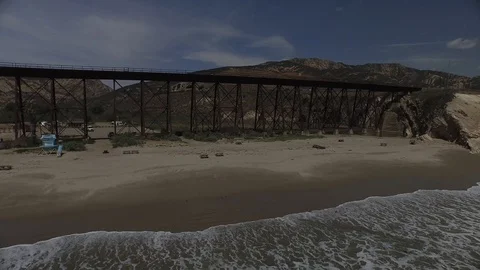 Sliding right past a train bridge 001125 DJI_0001 Stock Footage 90020497