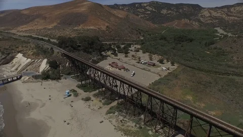 Sliding right past a train bridge 001205 DJI_0001 Stock Footage 90020517