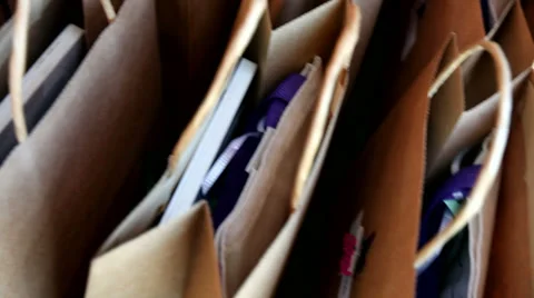 Sliding shot of loop bags Stock Footage 32869720