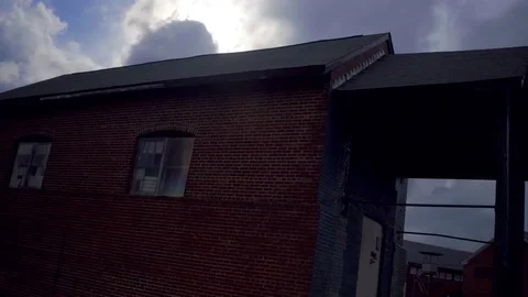 Sliding Shot of Lorton Prison Yard workshop Stock Footage 77375443