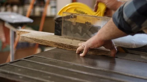 Sliding shot of table saw in use Video stock 88197898