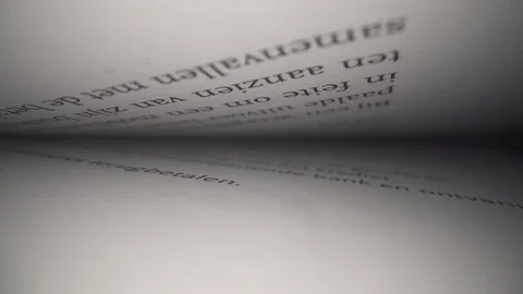 Sliding slowly through textbook books with black Phrases Stock Footage 124014685