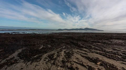 Sliding Time Lapse on the beach looking out to Kapiti Island in New Zealand Stock Footage 131204865