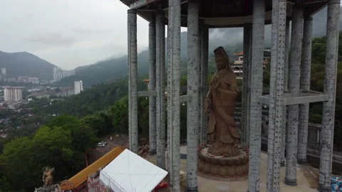 Sliding toward statue Guanyin statue in Pavilion Stock Footage 150304569