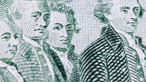 Sliding video of a two US dollar bill note Stock Footage 123990911