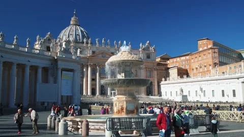 Sliding view of Saint Peter in Vatican, Rome, with a fountain in the foreground Stock Footage 147192048