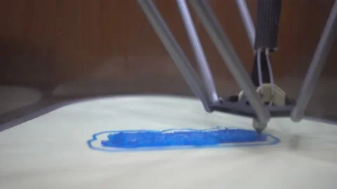 Slightly Blurred Sideview 3D Printer Closeup Printing Of Design On Buildplat Video stock 165629055