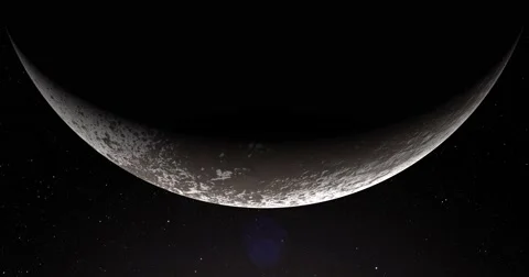 A slightly off-camera sun illuminates a crescent of Iapetus' surface. Stock-Footage 63804306