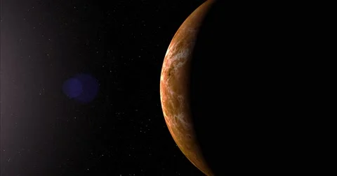 A slightly off-camera sun illuminates a crescent of Venus' surface. Stock Footage 63806568