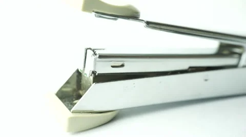 Slightly defocused and closeup of office steel stapler. Moving shot around. Stock Footage 41840943