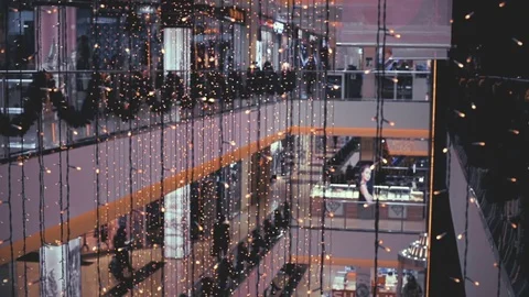 Slightly defocused crowd of walking people in the newly opened shopping mall Stock Footage 69996735