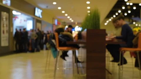Slightly defocused crowd of walking people in the newly opened shopping mall Stock Footage 72705789