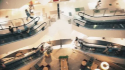 Slightly defocused crowd of walking people in the newly opened shopping mall Video stock 78129232
