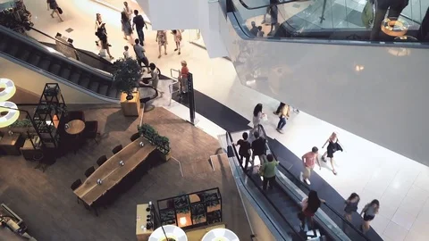 Slightly defocused crowd of walking people in the newly opened shopping mall Stock Footage 78129354