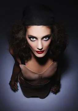 Slightly deranged. Studio portrait of a beautiful young fashion model. Stock Photos