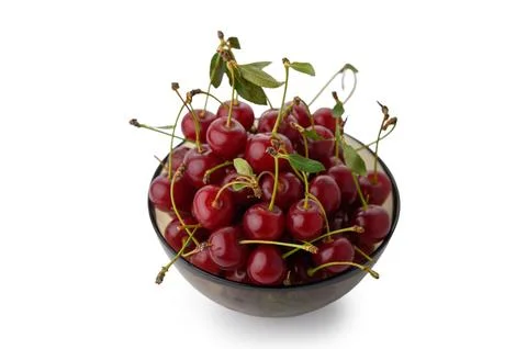 Slightly elevated perspective view of fresh ripe red cherries with stems an.. Stock Photos