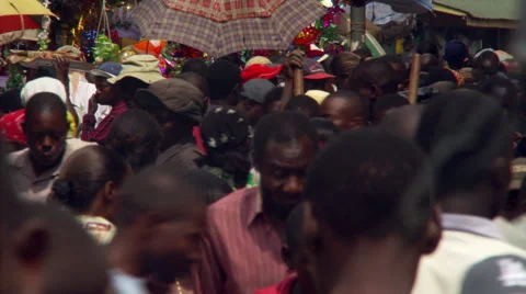 Slightly elevated view of crowded street market in an African city Stock Footage 59453524