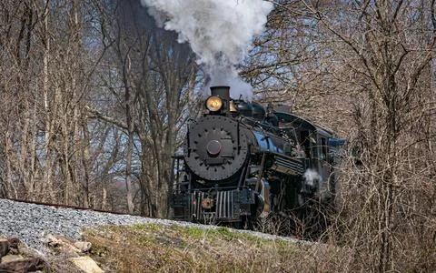 Slightly Lower View of an Approaching Restored Narrow Gauge Passenger Steam Stock Photos