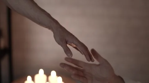 A slightly more general plan: the woman's hand is lowered downc 스톡 동영상 313878240