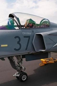 Slightly open canopy and visible ejection seat of military jet airplane Stock-Fotos