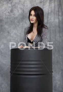 Slim brunette model in black lingerie Stock Photos