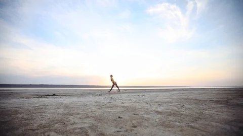 Slim lady performs yoga stretching poses and relaxes Stock Footage 112328176