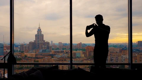 Slim man for a long time trying to take a selfie Stock Footage 103199470