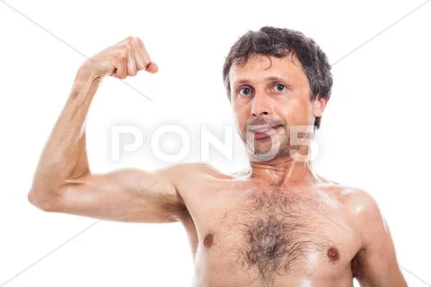 Slim man showing biceps Stock Photos