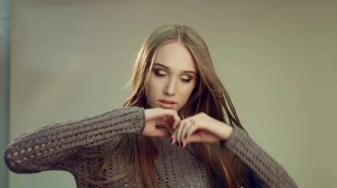 Slim model posing for the photographer in studio Stock Footage 62604570