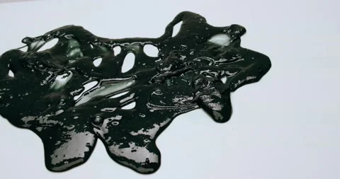 Slime, a viscous black substance Stock Footage 226971862