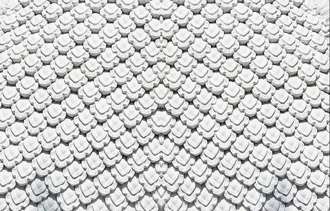 Slimless pattern three-dimensional hand-crafted stucco paintings install on.. Foto stock