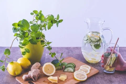 Slimming drink, ginger, lemon, mint and cucumber Stock Photos