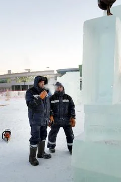 Slinger at the ice panel with a cigarette 스톡 사진