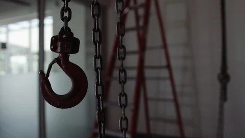 A Slip Hook Hangs On The End Of A Chain On A Construction Site Stock Footage 87481256