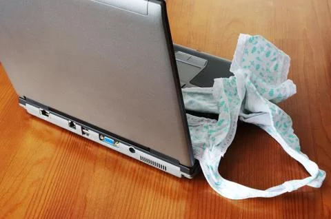 Slip on laptop Stock Photos