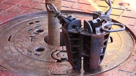 Slip on the rotary table while drilling oil well Stock Footage 48056748