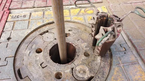 Slip on the rotary table while drilling oil well Stock Footage 111176933