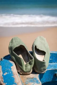 Slipper  in the beach Stock Photos