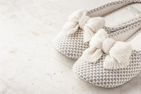 Slipper with bow on the white background horizontal Stock Photos