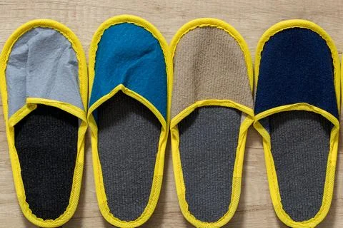 Slippers of different colors Stock Photos