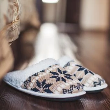 Slippers on floor Stock Photos
