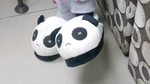 Slippers look like panda Stock Footage 54311534