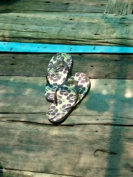 Slippers on wood Stock Photos