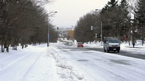 Slippery Ice and Snow on Road inSapporo, Japan Stock Footage 100874717