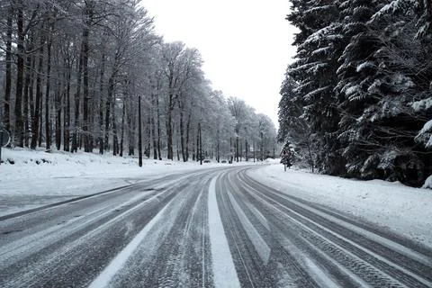 Slippery snowy road Stock Photos