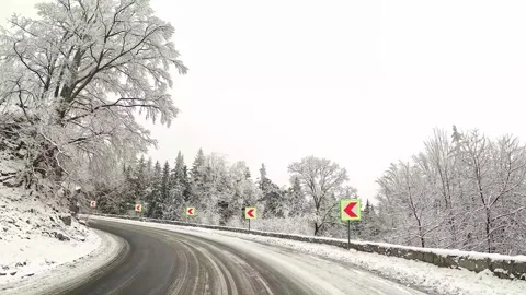 Slippery turn in the mountains slow motion Stock Footage 317332997
