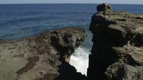 Slit in Black Basalt Cliffs Stock Footage 32153946