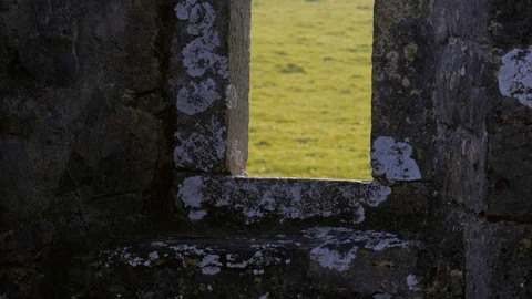 Slit Window View to Green Field County Mayo Ireland Stock Footage 98908152